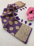 Premium Banarasi Soft Silk Sarees with Golden zari Buti weaves all over the body, having rich zari woven pallu and paired with BUTI WORK running Blouse- LIGHT PURPLE